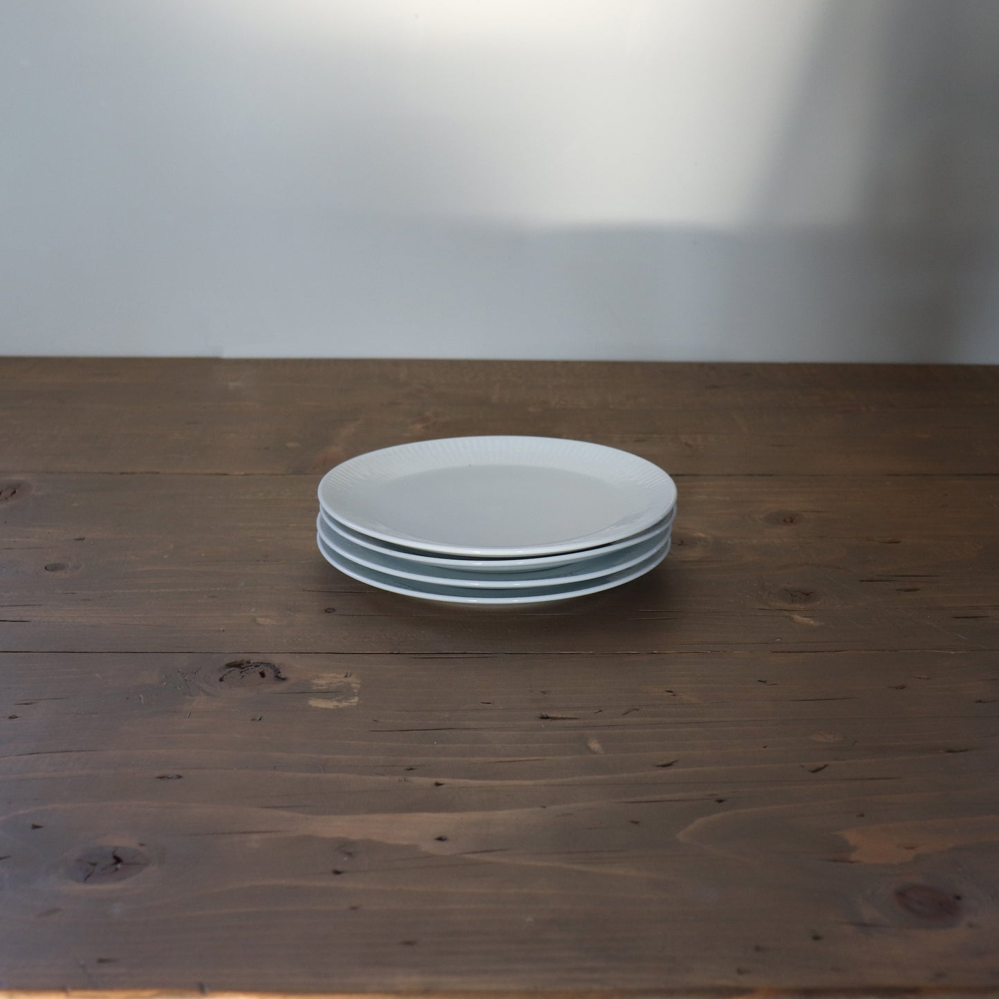 Set of 4 Small White Ribbed Plates